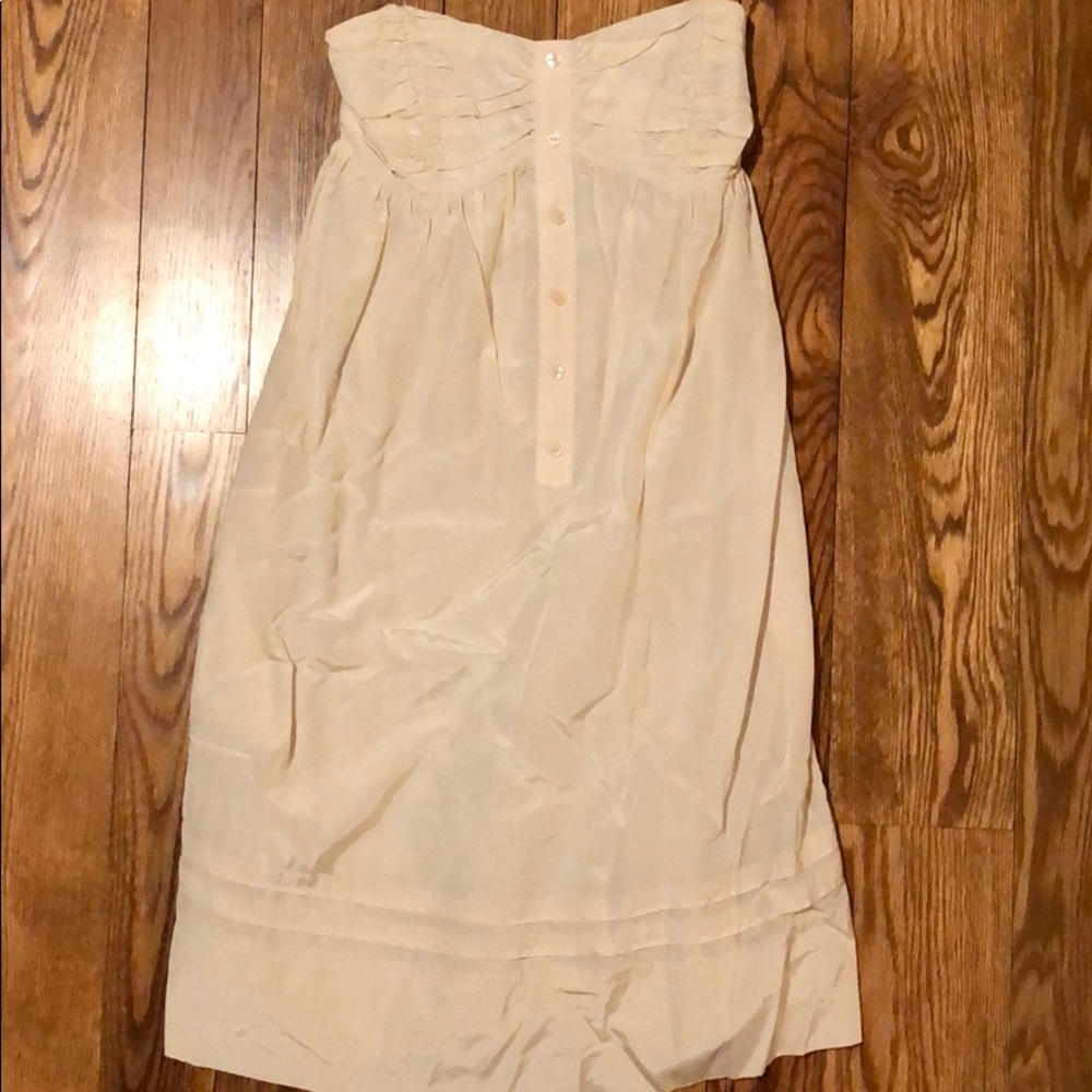 Strapless off white dress with unique details